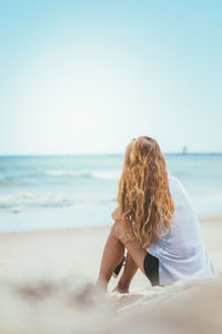 Blond girl on the beach 