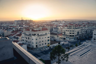 High angle view of townscape against sky during sunset