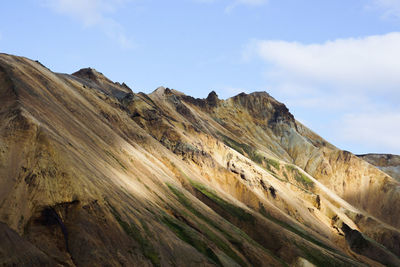 Scenic view of rocky mountains against sky