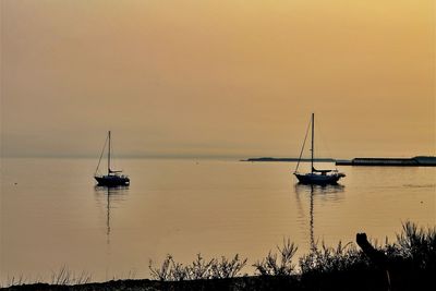 Sailboat sailing on sea