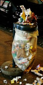 Close-up of garbage in glass on table