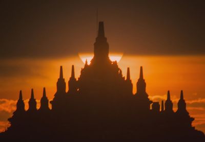 Silhouette of temple during sunset