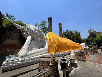 Low angle view of statue against sky