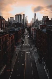 High angle view of street amidst buildings in city