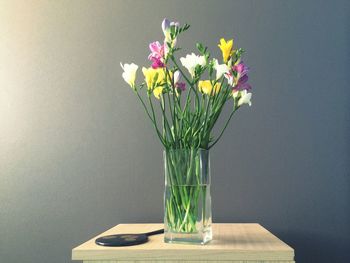 Close-up of flower vase on table