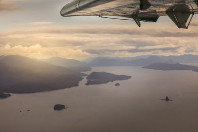 Scenic view of fjord against sky