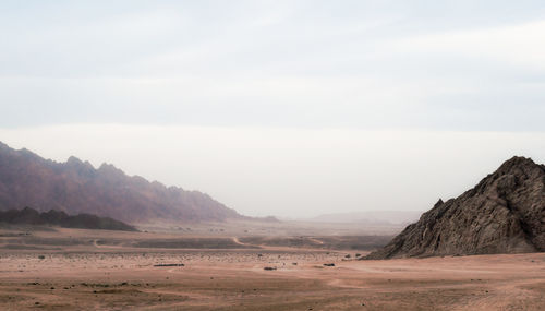 Scenic view of desert against sky