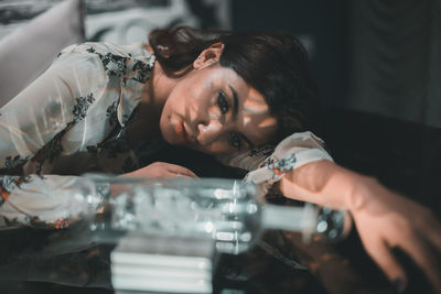 Portrait of a woman lying on the floor