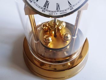 High angle view of clock on table