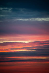 Scenic view of dramatic sky during sunset