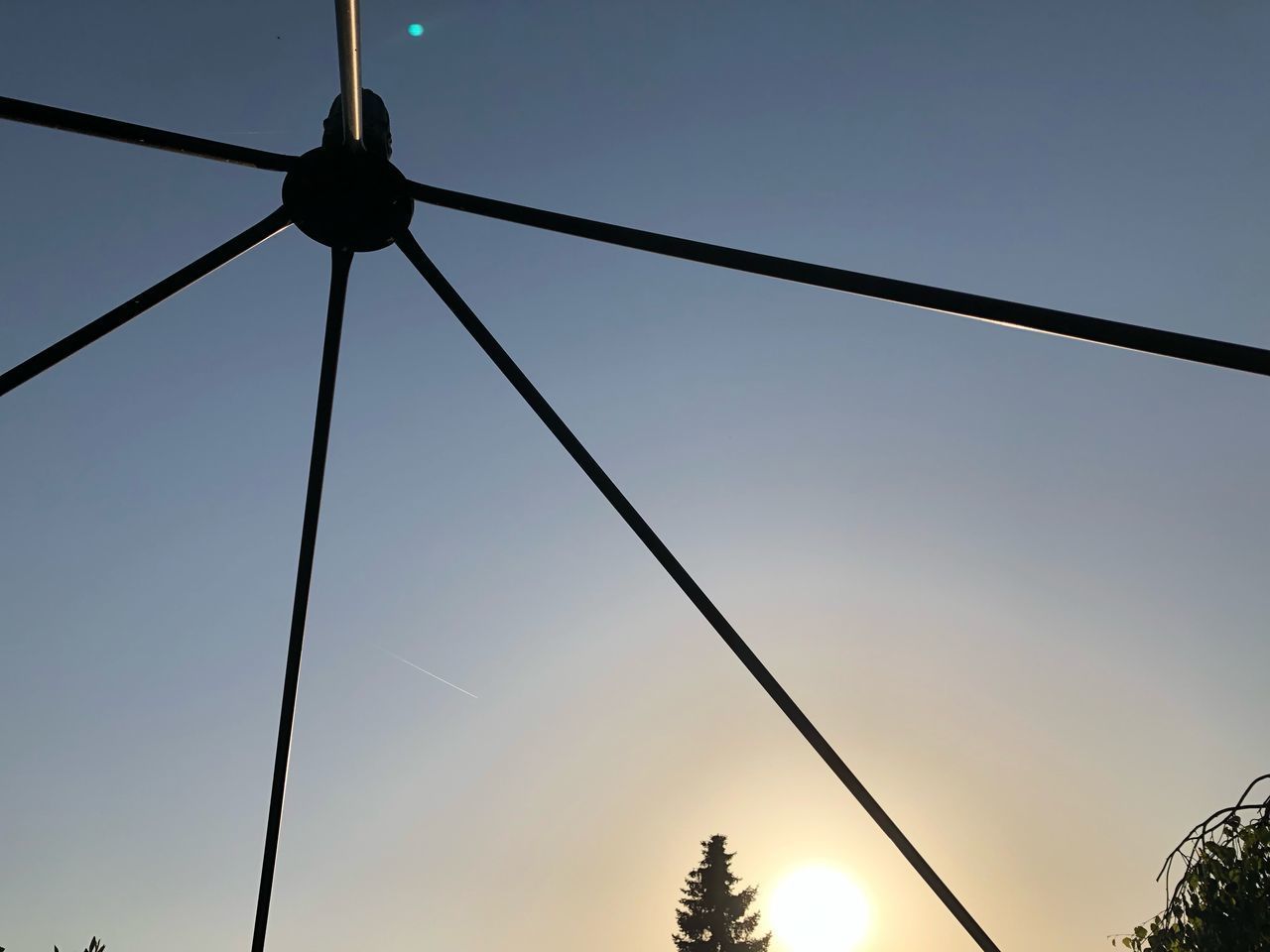 LOW ANGLE VIEW OF SILHOUETTE POLES AGAINST SKY