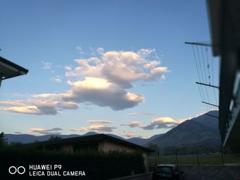 Scenic view of mountains against cloudy sky