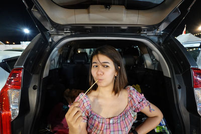 Portrait of a beautiful woman in car