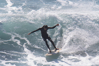 Man surfing in sea