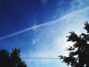 Low angle view of vapor trail in sky