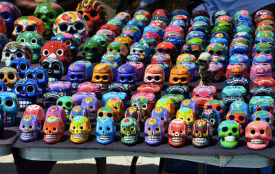 High angle view of colorful skulls for sale in market