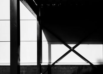 Low angle view of building seen through window