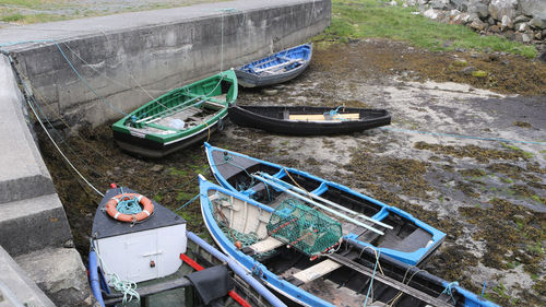 High angle view of abandoned boat moored at shore