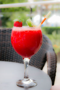 Close-up of cocktail in wineglass