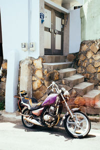 Bicycles parked against wall