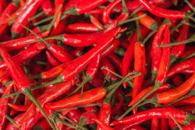 Full frame shot of red chili peppers for sale at market