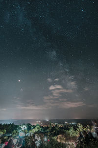 Scenic view of star field against sky at night