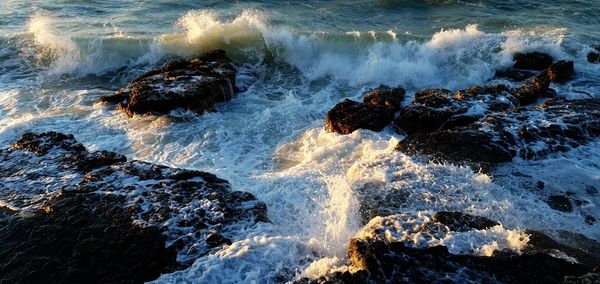 Scenic view of rocks in sea