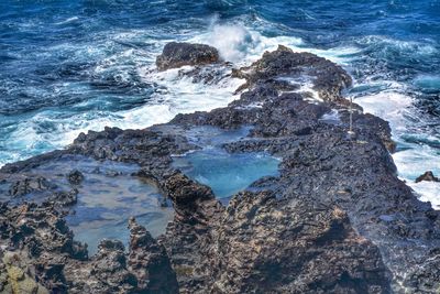 High angle view of rocks on beach