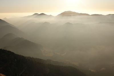 Scenic view of mountains against sky during sunset
