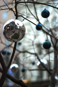 Low angle view of decoration hanging against sky