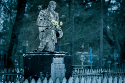 Statue of angel in cemetery