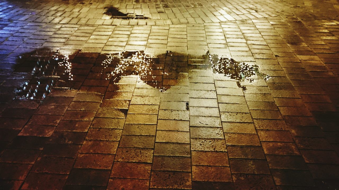 cobblestone, paving stone, tiled floor, high angle view, sidewalk, tile, flooring, footpath, pattern, street, wall - building feature, pavement, floor, no people, outdoors, full frame, day, shadow, sunlight, reflection