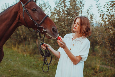 Young man with horse