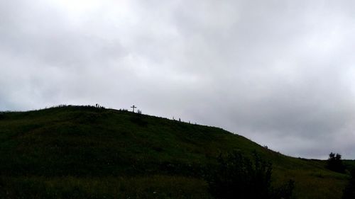 Low angle view of land against sky