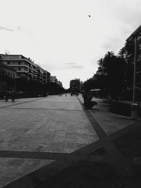 Road in city against sky