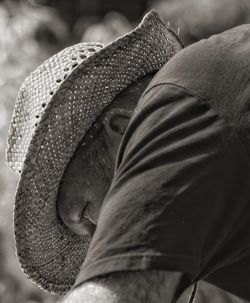 Close-up of man wearing hat