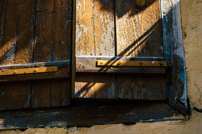 Abandoned metal door of old building