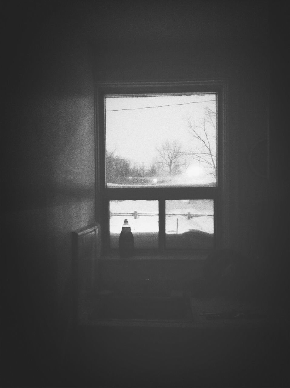 indoors, window, architecture, built structure, silhouette, house, glass - material, tree, bare tree, abandoned, building exterior, home interior, dark, sky, day, transparent, looking through window, winter, cold temperature, nature