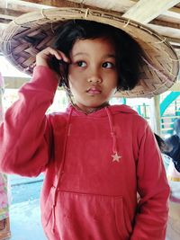 Portrait of cute girl standing outdoors