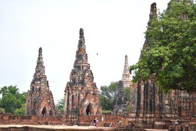 Old temple building against sky