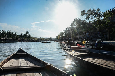 Scenic view of lake against sky on sunny day