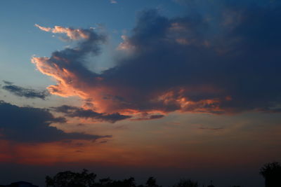 Low angle view of dramatic sky during sunset