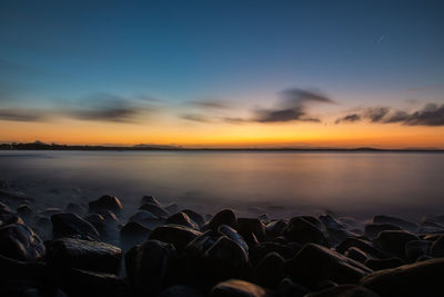 Sunset over calm sea