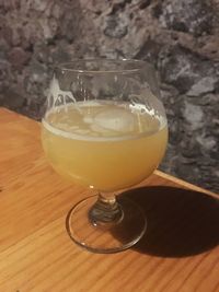 Close-up of beer glass on table