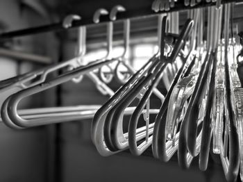 Close-up of clothes hanging on rack