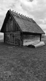 House on field against sky