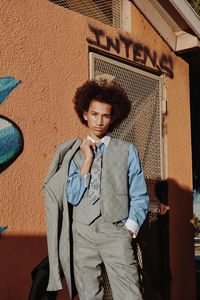 Portrait of young man standing outdoors