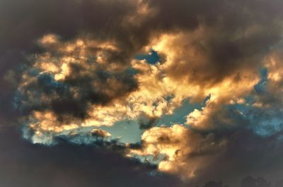 Low angle view of clouds in sky during sunset