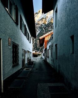 Narrow alley amidst buildings in city