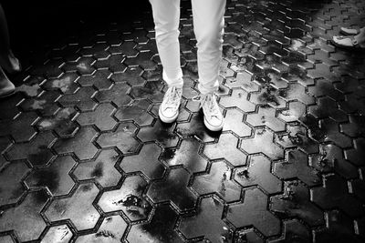 Low section of woman standing on floor